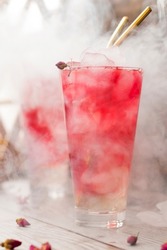 Cold drink ovshala. Refreshing summer pink lemonade. Rose cocktail. vertical position
