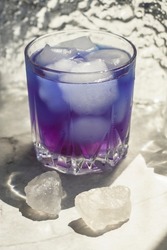 Iced pea flower tea or blue tea. The blue color of the drink will change to purple in an acidic environment if lemon is added to the tea. Healthy vegan drink anchan