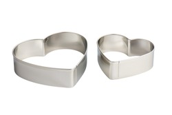 Two stainless steel heart-shaped cookie cutters, isolated