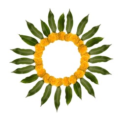 Round border with blank space made with marigild flowers and mango leaves. Hindu religious objects and elements for auspicious evenets, Diwali and wedding ceremony etc.  