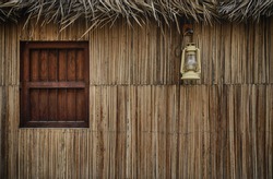 Facade of a traditional arabian home made with palm leaves.