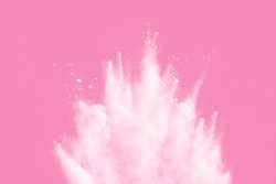 White powder explosion  on pink background. White dust splash cloud on pink background. 