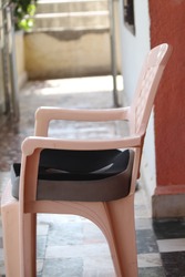 Memory foam Coccyx cushion in plastic chair