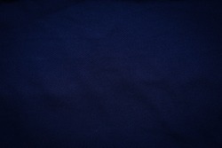 dark navy blue fabric for background.