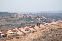 Ofarim Settlement and Palestinian Village (al)Luban and Rantis village on its background