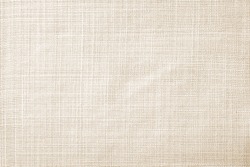 Close up beige table cloth fabric texture wallpaper background