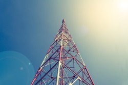 image of Tele-radio tower with blue sky for background usage .