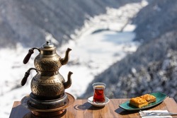 Turkish Tea and Laz Boregi in the Winter Season, Uzungol Lake, Caykara Trabzon Turkey