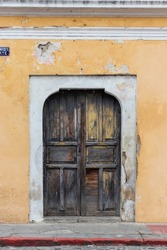 Old colonial door in antigua guatemala , colonial style architecture