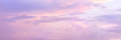 Beautiful sky with soft sunlight in pink and purple. Panorama of the beautiful sky..