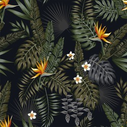 Tropical leaves and flowers in the night style for men's prints. Seamless vector jungle wallpaper pattern black background