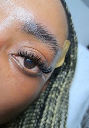 eyelash extensions in beauty salon macro eye top view 