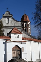 a fragment of the complex of Benedictine sisters with a church tower