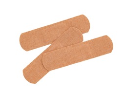 three adhesive plasters strip, medical sticking plasters isolated on white background, top view of beige adhesive bandages
