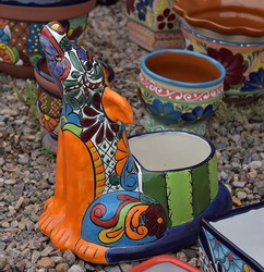 Hand made and painted colored pottery for sale at local street market