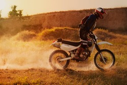 Motocross Rider At The Sunset