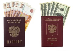 Russian passports with money. Russian internal passport with rubles. Russian international passport with dollars. 