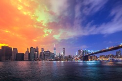 Brooklyn Bridge in a warm summer Day to Night New York City, USA