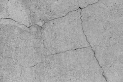 Concrete with Crack background. Old broken Cement Floor Wall. Chapped stone asphalt surface texture. Shades Gray color for copyspace..
