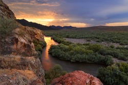 Scenic Landscape with flowing river and dramatic sky. Lower salt river, Arizona, USA.