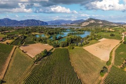 Panoramic aerial view of Franciacorta countryside in summer season, Brescia province in Lombardy district, Italy.