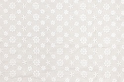 Flat white-colored lace fabric texture background. This fabric is made of 100% cotton.