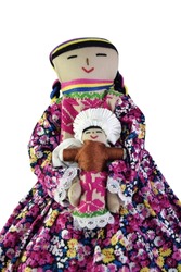 Traditional Mexican doll belonging to the Otomi ethnic group from Amealco, Queretaro. The doll wears traditional handmade clothing. 