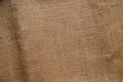 Burlap background and texture,Brown crumpled burlap texture background,Brown sackcloth texture or background and empty space.
