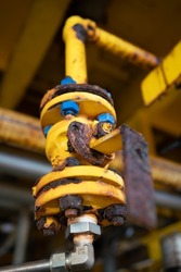 Close-up of corroded steel pipe, valve ,corrosion of steel, general corrosion, offshore petroleum pipelines.