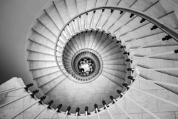 Beautiful circular staircase in old house, snail geometry, black and white