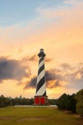 Cape Hatteras Light House with colorful sky on Hatteras Island in the Outer Banks in the town of Buxton, North Carolina. The lighthouse is part of the Cape Hatteras National Seashore