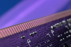 contacts of a microchip of random access memory close-up.
