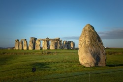 Heel stone, an important stone in Stonehenge, the UNESCO World Heritage site in England during beautiful morning light
