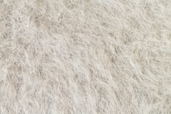 Gray alpaca fabric, mohair wool or angora textured background