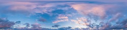 Dark blue sunset sky with Cumulus clouds. Seamless hdr panorama in spherical equirectangular format. Complete zenith for use in 3D, game and as sky replacement for aerial drone 360 panoramas.