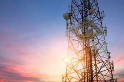 Satellite dish telecom network at sunset communication technology network
