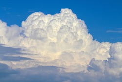 Large Cumulonimbus calvus clouds close-up. Thunderclouds