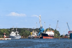 Port of the city of Baltiysk. Warship and Oil Products Tanker