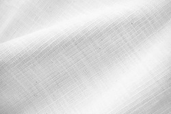 natural fabric linen texture for design. sackcloth textured. White Canvas for Background.. Image has shallow depth of field.