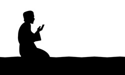 the silhouette of a moslem praying. Vector Illustration