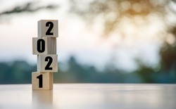 Vertical wooden cubes have numbers 2021, the start of the new year.