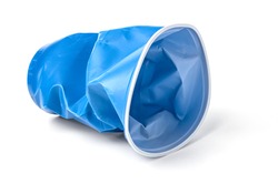 a battered blue plastic cup, insulated on a white background