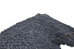 large pile of black coal and a full shovel of coal isolated on a white background.
