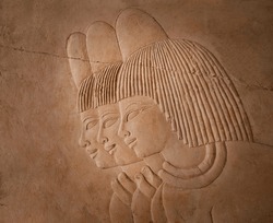 relief showing three men with short haired wigs from the tomb of the Royal Scribe (Khaemhat ) in Thebes - Luxor . Egypt .  
