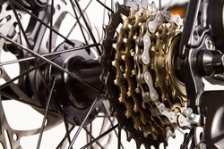 Bicycle disc brakes close-up, spokes. Bicycle brake adjustment.
