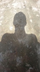 Human shadow in the morning.