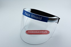 Face shield on a white background. Pandemic COVID-19 virus and protection against coronavirus concept.