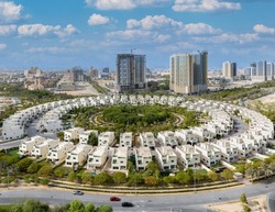 Aerial view of town house villa community in Jumeirah village circle Dubai