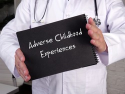 Medical concept about Adverse Childhood Experiences with phrase on the sheet.