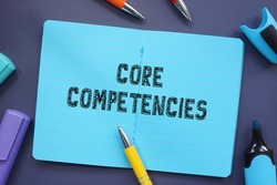 Financial concept about Core Competencies with inscription on the piece of paper. 